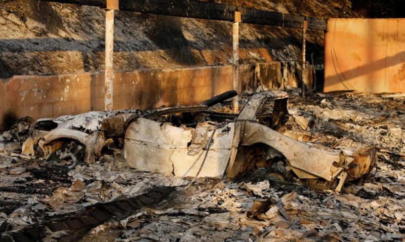 Calif. wildfires roar out of control, whipped by Santa Ana winds