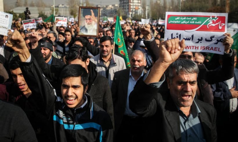 Iran hard-liners rally as protests roil major cities